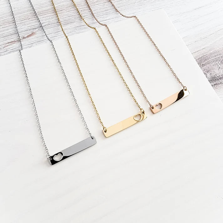 Horizontal bar necklace with heart cut out