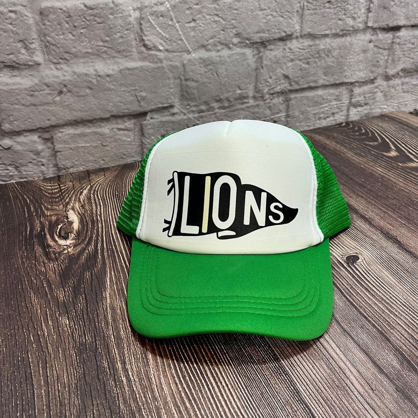 Lions Pendant Trucker Hat